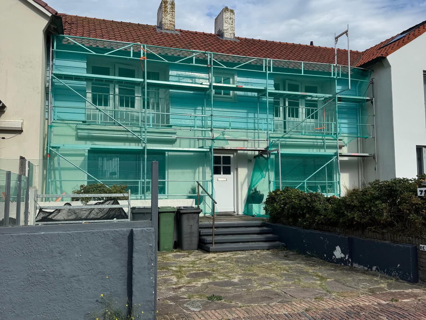 Gevelsteiger met beschermdoek van Steiger Amsterdam